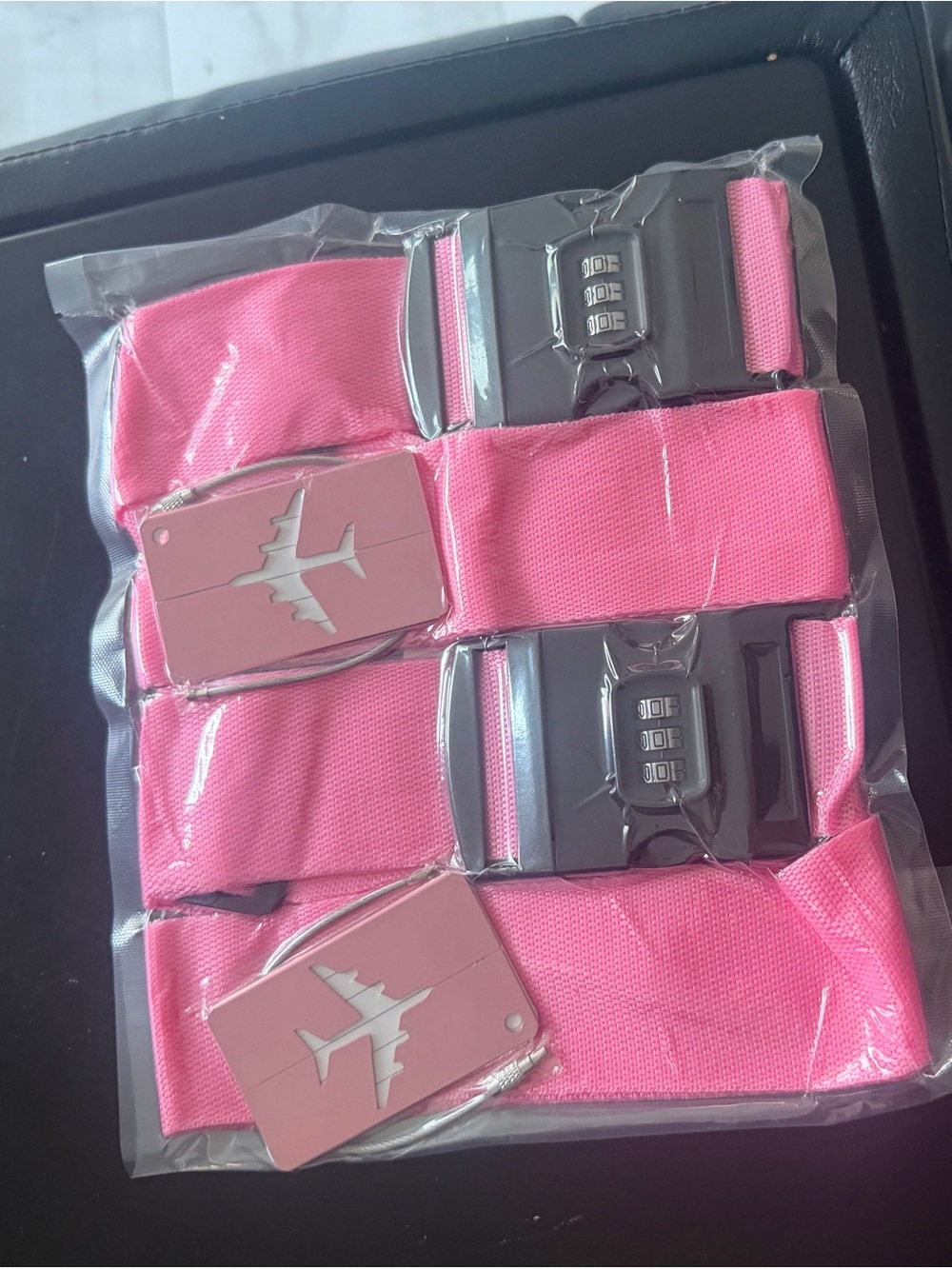 Pink Luggage Strap with Combination Lock and Airplane Tag